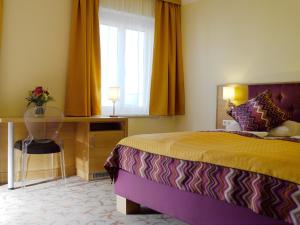 Letto o letti in una camera di Hotel Drei Raben