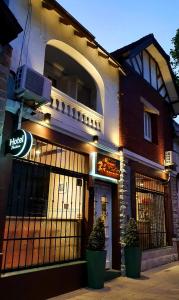 a building with a sign on the front of it at Hotel Positano in Mar del Plata