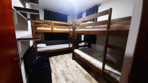 Poschodová posteľ alebo postele v izbe v ubytovaní Colina do Cristal
