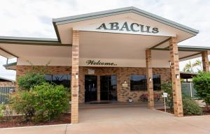 a abacus store front with a sign on it at Abacus Motel in Mount Isa