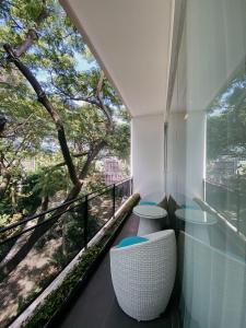 A balcony or terrace at K Gallery Hotel