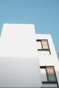 an image of the side of a white building at Belly Inn Douliu in Douliu