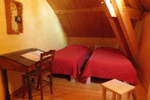 Postel nebo postele na pokoji v ubytování Che'Val d'Amour