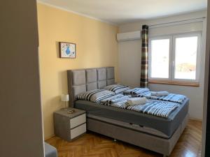 Postel nebo postele na pokoji v ubytování Sobe "šime & Joso" - Knin