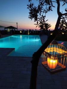 Bazén v ubytování Agriturismo Sa Murta in Sennariolo-Oristano nebo v jeho okolí