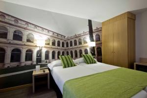 Postel nebo postele na pokoji v ubytování ELE Enara Boutique Hotel