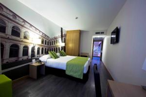 Postel nebo postele na pokoji v ubytování ELE Enara Boutique Hotel