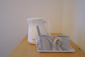 Plaza In Kanku Hotel的咖啡和沏茶工具