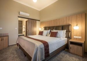 Voodi või voodid majutusasutuse EFI SPA Hotel Superior & Pivovar toas