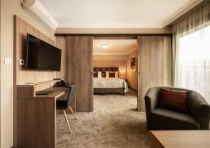 TV a/nebo společenská místnost v ubytování EFI SPA Hotel Superior & Pivovar