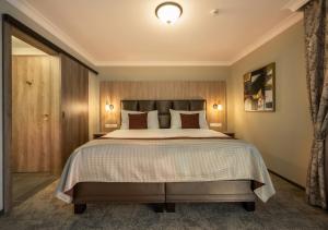 Voodi või voodid majutusasutuse EFI SPA Hotel Superior & Pivovar toas