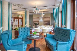 Posezení v ubytování Hotel Rigga
