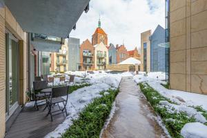 Old Town Neptun Apartments by Noclegi Renters v zime