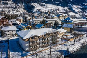 an aerial view of a town with snow covered buildings at Haus Bergblick by AlpenTravel in Bad Hofgastein