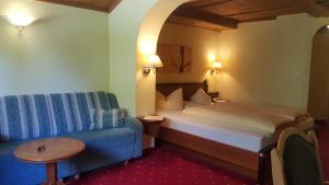 Postel nebo postele na pokoji v ubytování Hotel Kristall - Adults Only