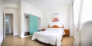 Krevet ili kreveti u jedinici u okviru objekta Delfín Playa Basic Ha Apartment
