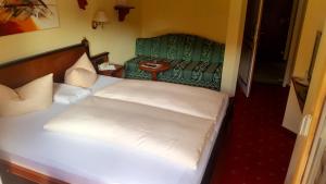 Postel nebo postele na pokoji v ubytování Hotel Kristall - Adults Only