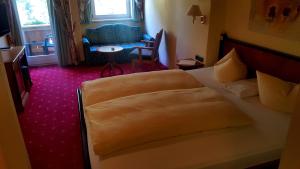 Postel nebo postele na pokoji v ubytování Hotel Kristall - Adults Only
