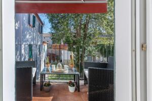 A balcony or terrace at Palazzo 1500 Frescobaldi - Piano nobile x 5 - A Casa di Alfonso