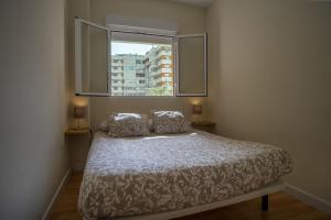 Postel nebo postele na pokoji v ubytování Sirenas Playa Ha Apartment