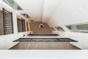 Mon Suites Benlliure客房内的一张或多张床位