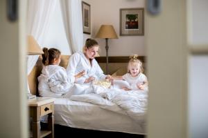Postel nebo postele na pokoji v ubytování Art Hotel