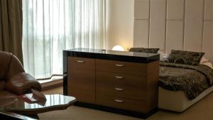 Voodi või voodid majutusasutuse Hotel Consul toas