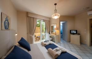 Postel nebo postele na pokoji v ubytování Boutique Hotel Su Sergenti + 37 fotografií