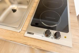 an ipod sitting on top of a counter at Apartments Crneković III in Baška +135 photos