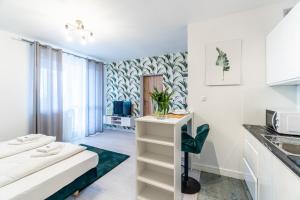 Ένα ή περισσότερα κρεβάτια σε δωμάτιο στο RoomService
