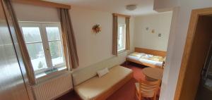 Postel nebo postele na pokoji v ubytování Hotel Děvín