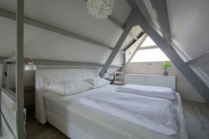 Postel nebo postele na pokoji v ubytování Sandepark 165- Groote Keeten