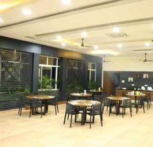 En restaurang eller annat matställe på The South Gate By WB Economy, Trivandrum