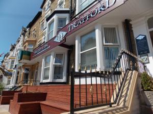 a building with a sign on the front of it at The Trafford Hotel in Blackpool