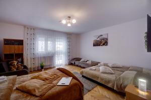 Łóżko lub łóżka w pokoju w obiekcie Apartamenty Bieszczady
