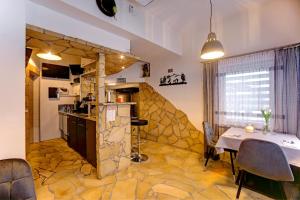 Kuchnia lub aneks kuchenny w obiekcie Apartamenty Bieszczady