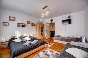 Łóżko lub łóżka w pokoju w obiekcie Apartamenty Bieszczady
