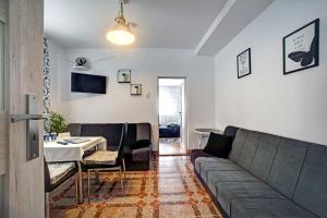 Telewizja i/lub zestaw kina domowego w obiekcie Apartamenty Bieszczady