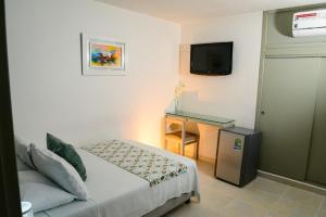 מיטה או מיטות בחדר ב-Hotel Quinta de Cabecera