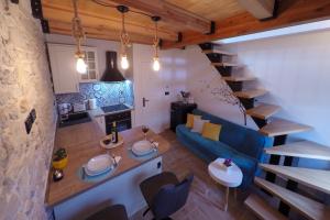 TV a/nebo společenská místnost v ubytování La Corte di Kate