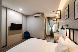 Postel nebo postele na pokoji v ubytování SVOK Hotel + 37 fotografií