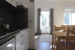 A cozinha ou kitchenette de Casas d'Almofala