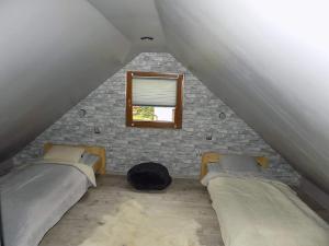 Łóżko lub łóżka w pokoju w obiekcie U Halinki