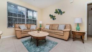 A seating area at Beautiful 5 Star Condo on the Prestigious Windsor Hills Resort, Orlando Condo 4791