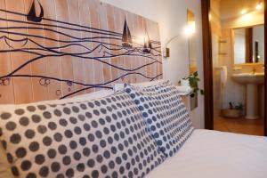 Postel nebo postele na pokoji v ubytování Il Melo Residence