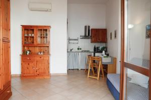 Kuchyň nebo kuchyňský kout v ubytování Il Melo Residence