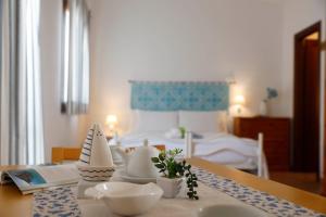 Postel nebo postele na pokoji v ubytování Il Melo Residence