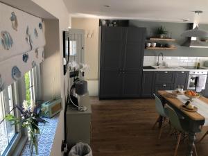 Kuchyň nebo kuchyňský kout v ubytování Cotswold Lodge