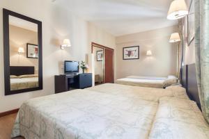 Cama o camas de una habitación en Crisol Riosol