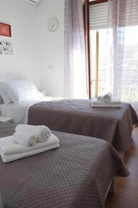 Postel nebo postele na pokoji v ubytování B&B Carlo V
